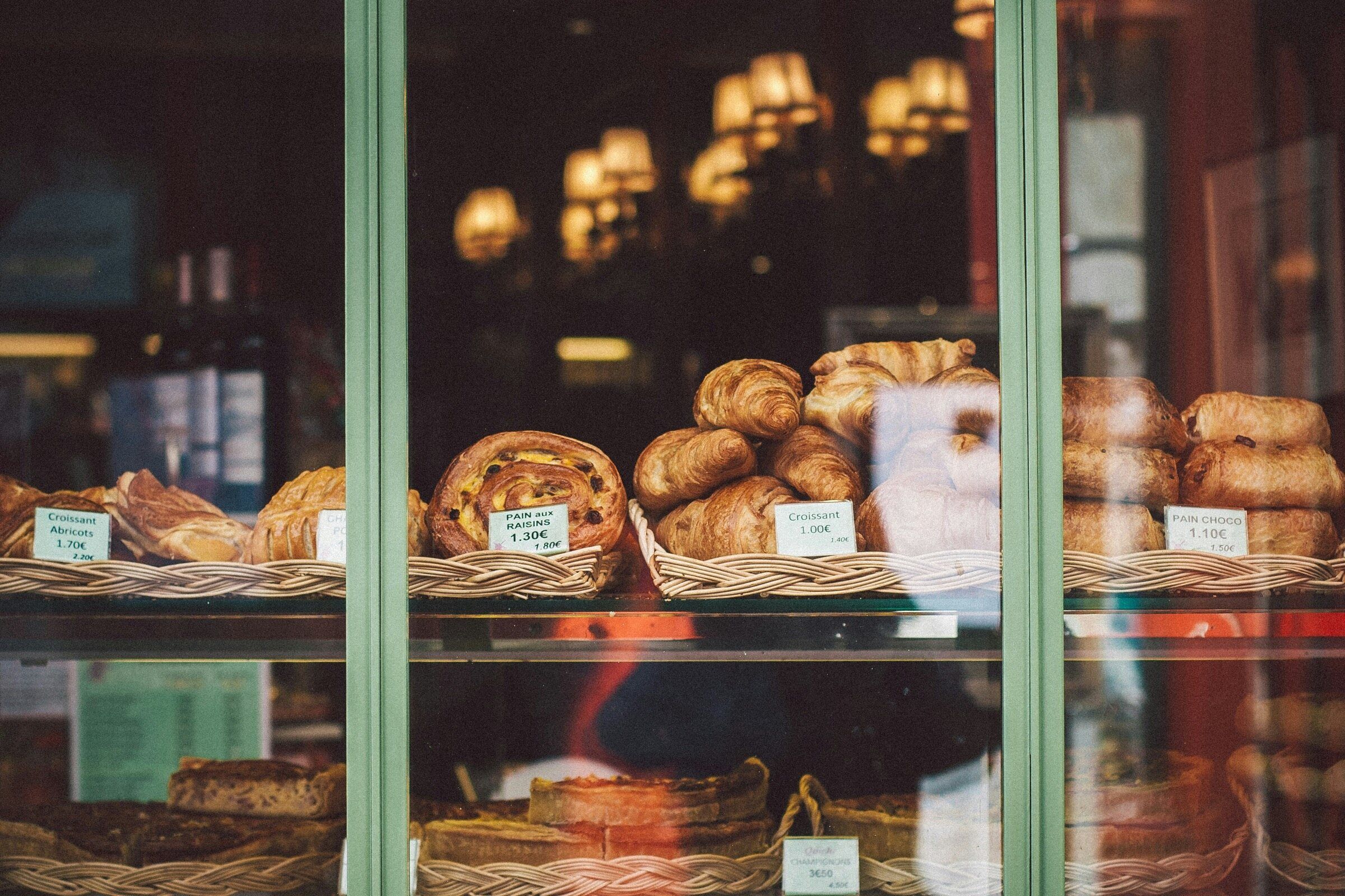 Pastries and bread in a bakery window